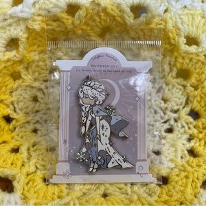 Snow Queen Enamel Pin by Califlair - Pin Club December 2024